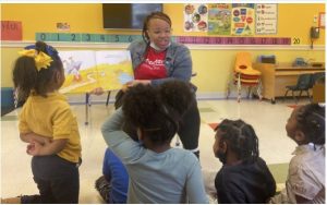 Mississippi Jumpstart volunteer I’Tasia Goston reads to a group of pre-K students at Little Saints Academy in Jackson. Since the program’s 2012 launch, volunteers have dedicated more than 172,500 hours to getting Mississippi children ready for kindergarten. Submitted photo