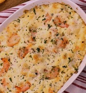 Hot Baked Shrimp Dip is the perfect dish to take to a tailgate party - or any gathering.