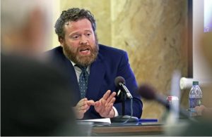 Drew Snyder, executive director of the Mississippi Division of Medicaid, gives an agency update to members of the House Medicaid Committee at the Capitol in Jackson, Miss., Wednesday, Jan. 23, 2019. (AP Photo/Rogelio V. Solis)