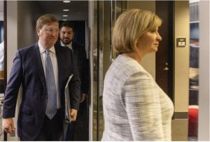 Gov. Tate Reeves, left, and University of Mississippi Medical Center chief Dr. LouAnn Woodward leave the press area of the Walter Sillers Building after the governor announced his plan for a series of Medicaid reimbursement reforms on Thursday, Sept. 21, 2023, in Jackson. Credit: Eric Shelton/Mississippi Today