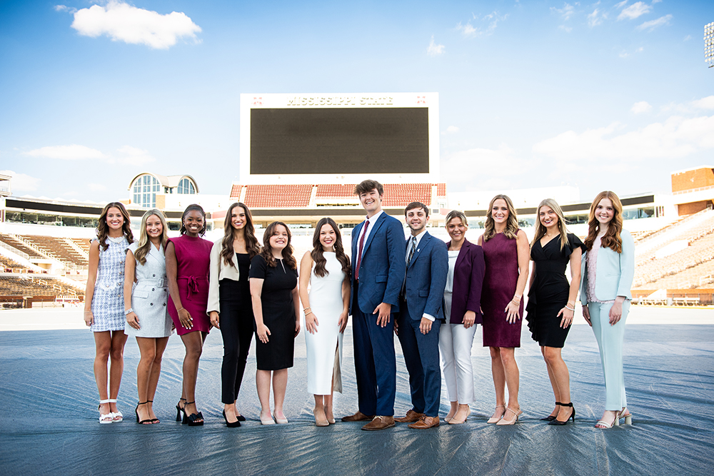 Mississippi State's 2023 Homecoming Court includes, left to right, Freshman Maid Ryan McKern of Hoover, Alabama; Sophomore Maid Reagan Felder of Madison; Junior Maid Reagan Hendricks of Hoover, Alabama; Senior Maid BeBe Rayborn of Brandon; Miss MSU Ann Olivia Radicioni of Clinton; Homecoming Queen Carrington Davis of Columbus; Homecoming King Cole Ray of Indian Springs, Alabama; Mr. MSU Matteo Mauro of Gulf Breeze, Florida; Senior Maid Rachel Carpenter of Corinth; Junior Maid Kellen Fairburn of Madison; Sophomore Maid Sadie Morris of Greenwood, Indiana; and Freshman Maid Katie Randall of Starkville. (Photo by Grace Cockrell)